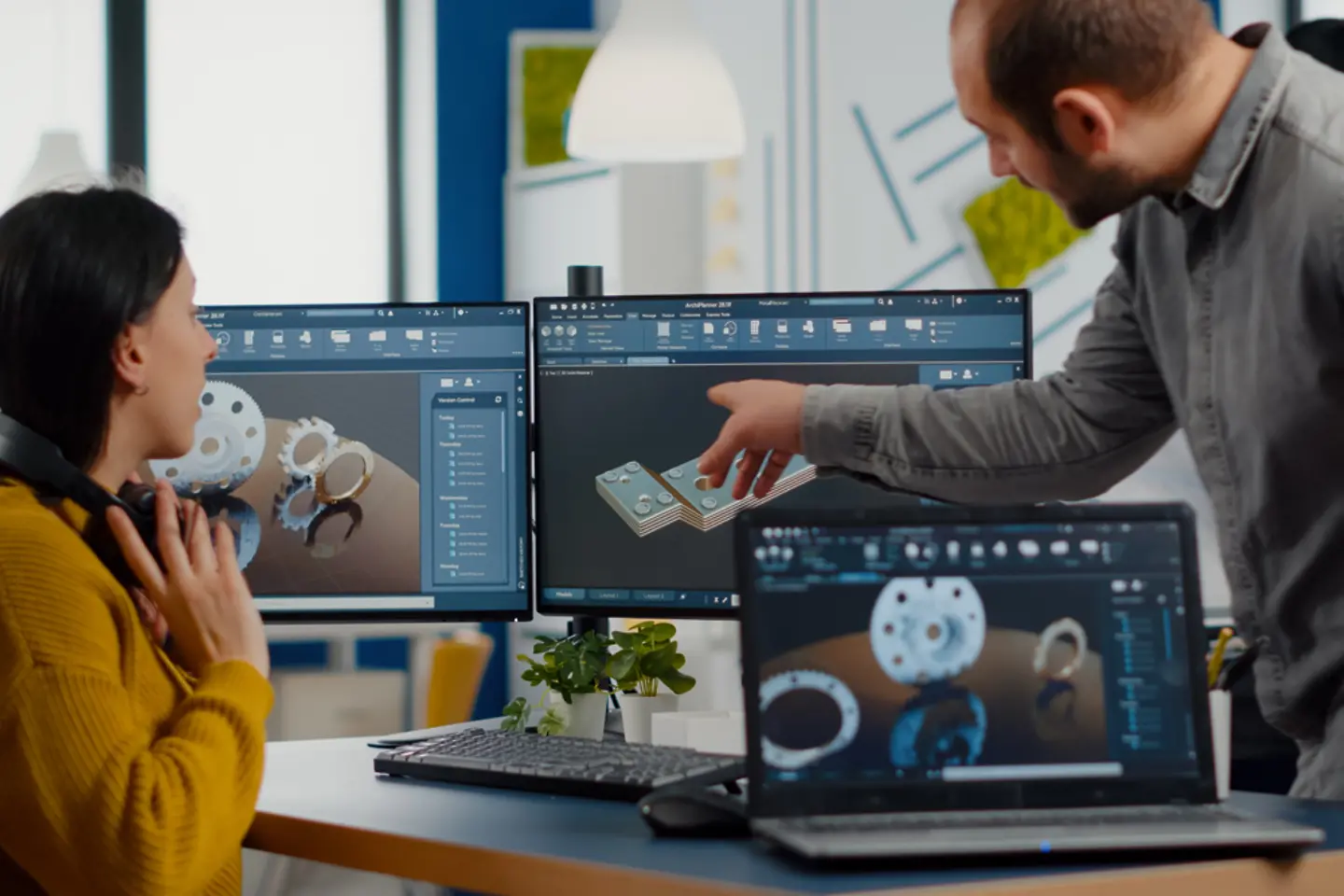 Team of professionals using CAD Software for modern industrial engineering design